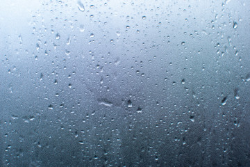 Rain drop on the glass window
