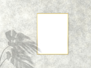 3x4 vertical Gold frame for photo or picture mockup on concrete background with shadow of monstera leaves. 3D rendering.
