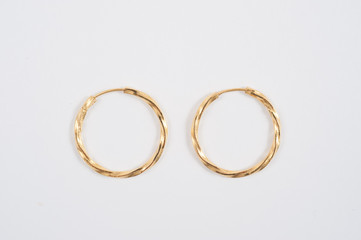 Loop gold earrings.