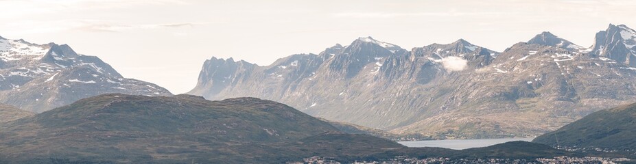 A panoramic landscape on mountains and a fjord in Northern Norway