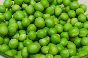 round and ripe green peas close-up