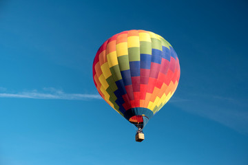 Detail of a starting colorful hot air balloon