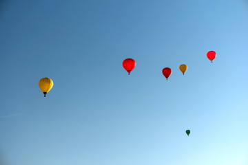 Several hot air balloons in the sky