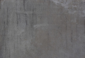 brown and gray asphalt. Rusty drips. Spots on the wall. Background like texture..