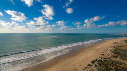 Fototapeta na wymiar Playa de Camposoto en San Fernando en puesta de Sol realizada con dron DJI