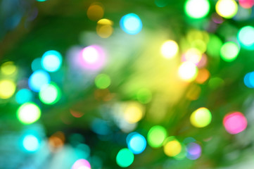 Blurred background of Christmas lights. New Year bokeh