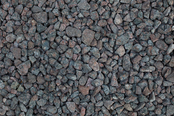 the texture of the gravel on the road