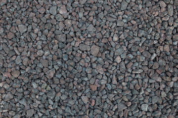 the texture of the gravel on the road