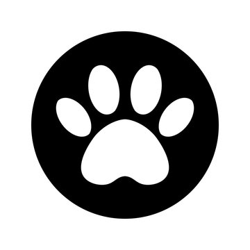 The dog's track in the black circle. cat and dog paw print inside circle