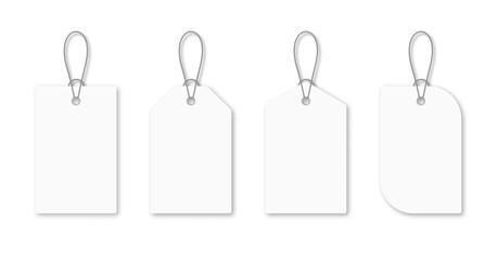 Set of blank white tags with rope. White shopping labels and price tags in different shapes. Mockup and template for paper price tag