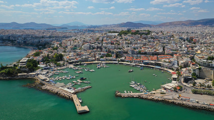 Aerial drone photo of iconic round shaped small port of Mikrolimano in the heart of Piraeus, Attica, Greece