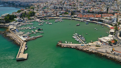 Fototapeta na wymiar Aerial drone photo of iconic round shaped small port of Mikrolimano in the heart of Piraeus, Attica, Greece