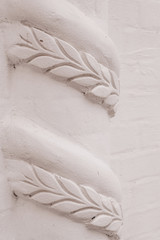 Elements of architectural decorations of buildings, gypsum stucco, wall texture, plaster ornaments and patterns