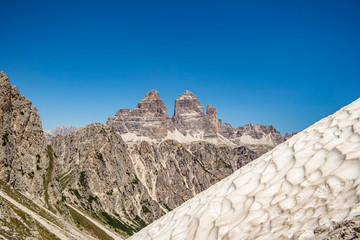 View of the Dolomite mountains of the Tre Cime Lavaredo at the Fratelli Fonda Savio refuge, Belluno - Italy