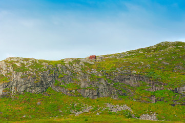 Beautiful Norwegian landscape with cute little house, way to Mount Ulriken, Bergen, Norway, on August 4 2019