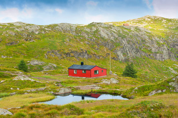 Beautiful Norwegian landscape with cute little house, way to Mount Ulriken, Bergen, Norway, on August 4 2019