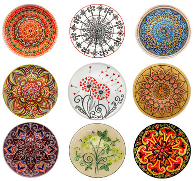 Set of decorative ceramic dishes hand-painted with acrylic paints floral  pattern isolated on white background foto de Stock | Adobe Stock