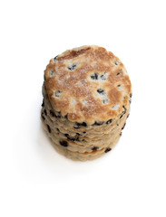 Stack of iced Welsh cakes isolated on white