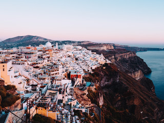 Fototapeta premium Sunset view of Fira, the capital of Santorini, Greece