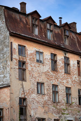 The old house is destroyed and the tenants evicted from it