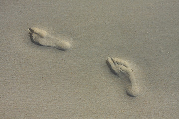 Footprints on Beach. outdoor sea.