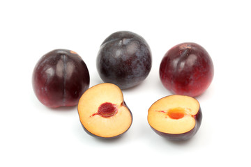 fresh plums isolated on white background