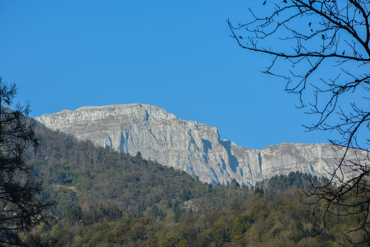 Mountains in Tolmin with blue sky in the background.