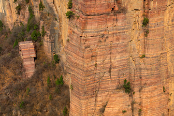 Sheer precipice and overhanging rocks rock texture