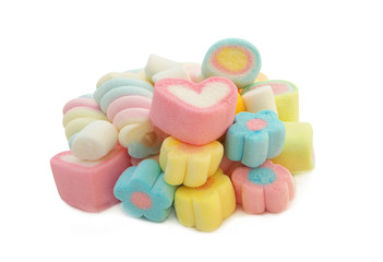 Many different marshmallow candies isolated on white background