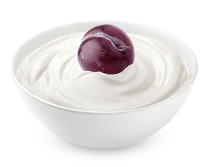 plum with sour cream, yogurt, isolated on white background, clipping path, full depth of field
