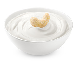 cashew nut, with sour cream, yogurt, isolated on white background, clipping path, full depth of field