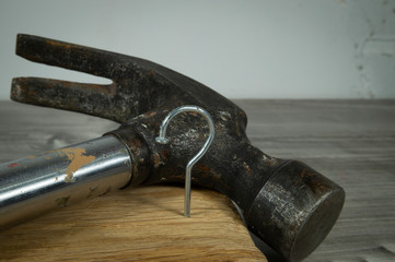 Construction nail shaped as question mark