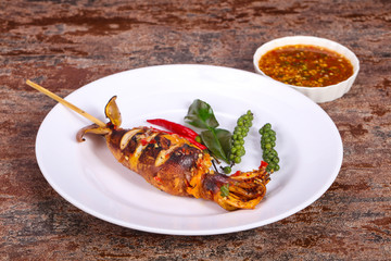 Grilled squid with sauce and hebs