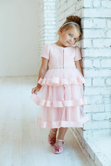 Little girl in a beautiful dress. 