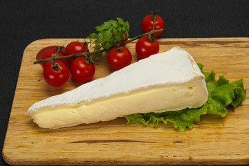 Brie cheese triangle served salad