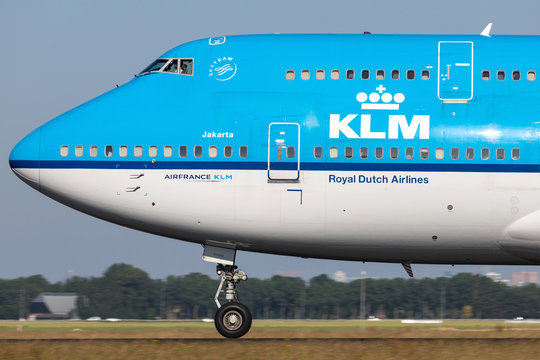 VIJFHUIZEN, THE NETHERLANDS - June 28, 2019: Dutch KLM Boeing 747-400 with registration PH-BFI on take off roll on runway 36L (Polderbaan) of Amsterdam Airport Schiphol.