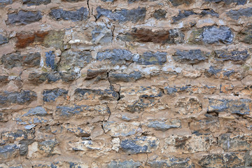 Cracked brick wall
