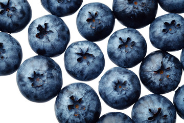 Fresh selected blueberries isolated on white background. Top view pattern