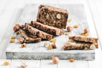Gluten-free bread with hazelnut and flax seeds on a wooden Board