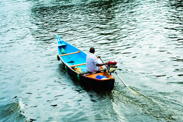 Obraz premium man in a boat