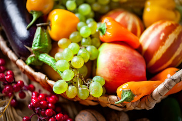 The table, decorated with vegetables and fruits. Harvest Festival. Happy Thanksgiving. Autumn background. Selective focus.