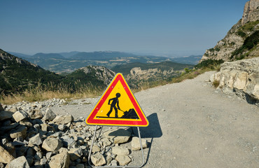 A road works sign indicating trail maintenance on the path from La Chaudiere to Les Trois Becs