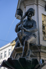 Fototapeta na wymiar Augsburg hercules fountain and sankt ulrich in maxstrasse, unesco world heritage site