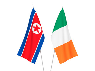 National fabric flags of Ireland and North Korea isolated on white background. 3d rendering illustration.