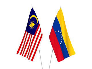 National fabric flags of Venezuela and Malaysia isolated on white background. 3d rendering illustration.