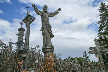 Obraz premium The picture from the hill of crosses by Šiauliai in Lithuania. Many crosses on this religious places and many of them old and abandoned. 