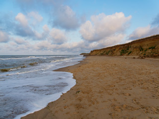 The incoming North Sea washes up Happisburgh beach on the Norfolk coast.