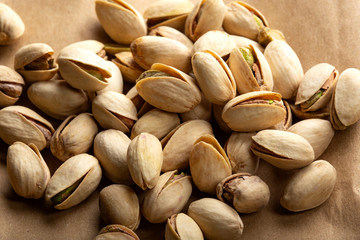 Fried and salty pistachio on paper
