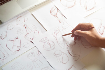 Production designer sketching Drawing Development Design product packaging prototype idea Creative...