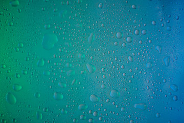  water drops on a colorful background